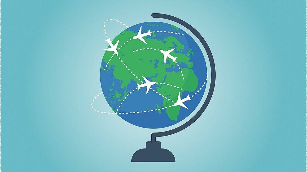 Symbolbild: Globus mit Flugzeugen