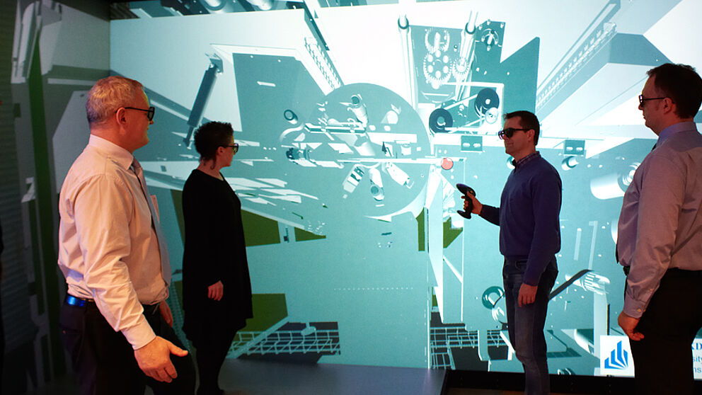 Abbildung: Virtuelles Design Review eines Produktionssystems am Beispiel einer Brötchenanlage der WP Kemper GmbH (© Heinz Nixdorf Institut)