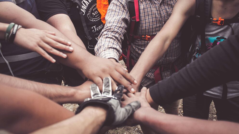hands reaching each other