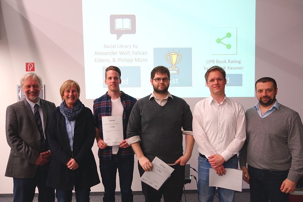 Foto: Zweiter Platz (v. l.): Prof. Dr. Wilhelm Schäfer (HNI), Kirsten Marggraff (Reply), Philipp Müns, Alexander Wolf, Fabian Eidens, Mauro Barone (Reply)