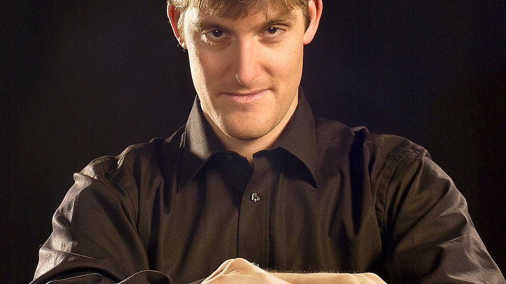 Foto: Solist beim Konzert des Hochschulorchesters: Felix Vogelsang (Violoncello)