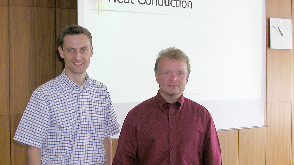 Foto: (v.li.): Dr.-Ing. Hans-Peter Heim und Prof. Dr. David Grewell